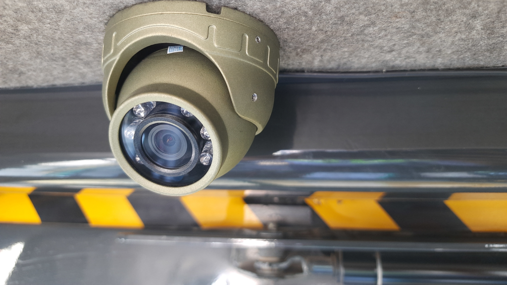 Interior camera monitoring the passenger compartment.